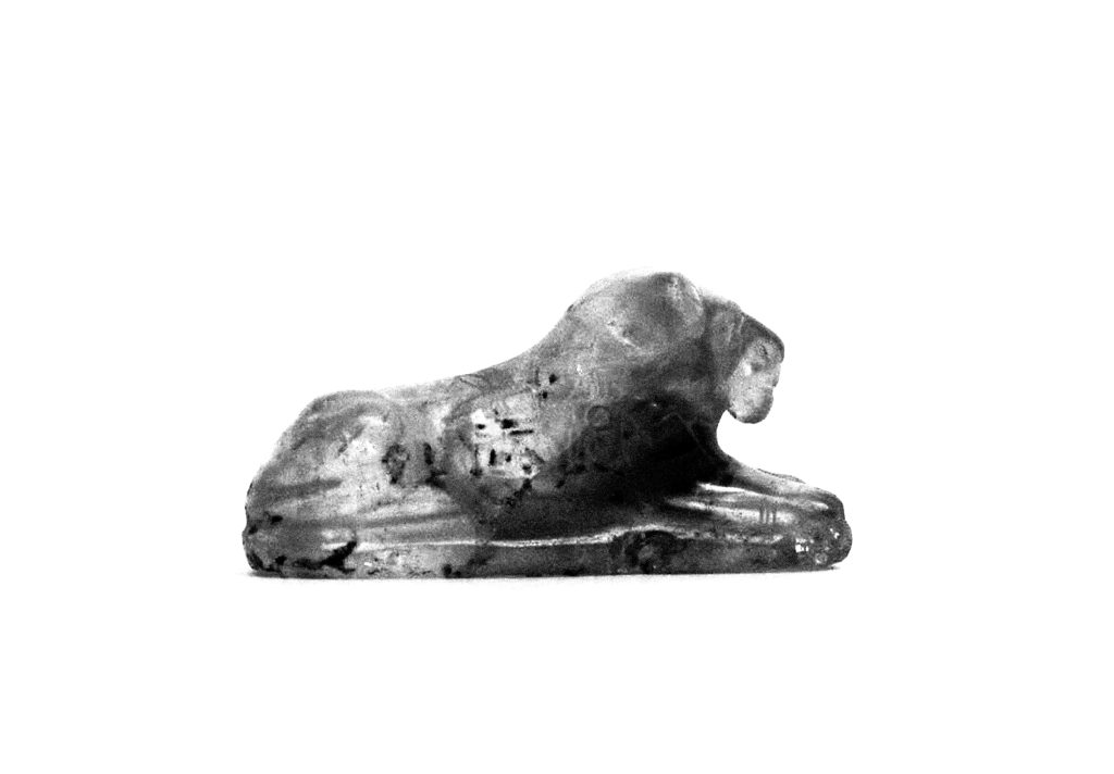 Lion Amulet, Perforated Lengthwise, Inscribed with the Name of Senwosret I and the Epithet "Beloved by the Souls [Ancient Rulers or Gods] of Heliopolis" (MET).